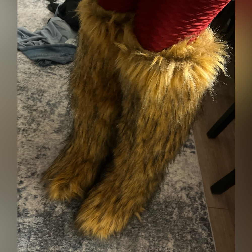 Tall furry boot